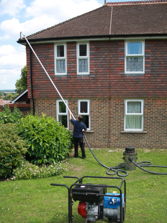 Gutter cleaning at a terraced house